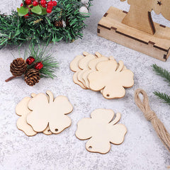 Wooden Christmas ornaments on a textured surface with decorative elements.
