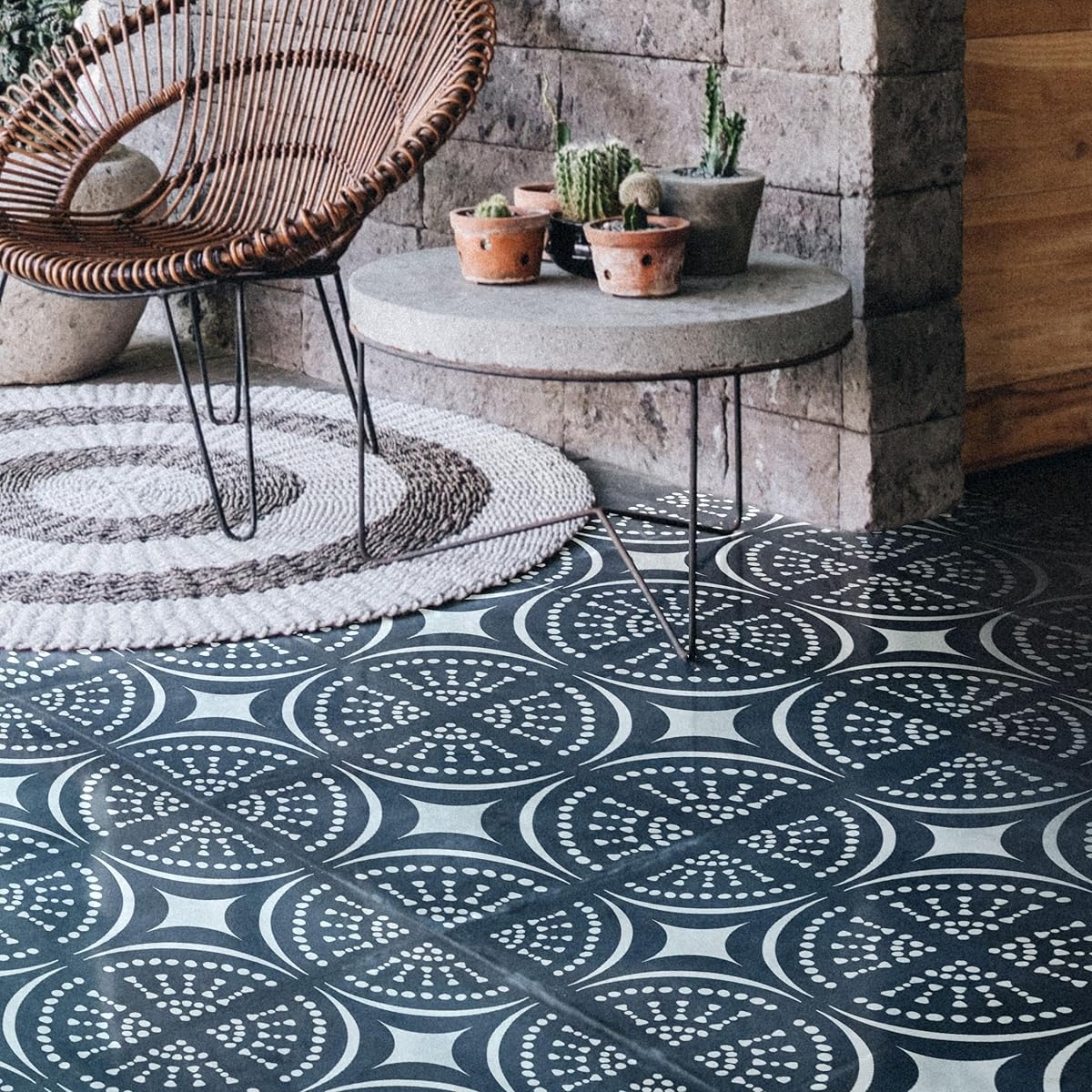 Patterned floor with a modern chair and table in the background