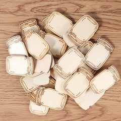 Wooden cutout shapes of jars on a wooden surface