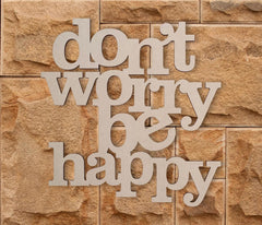 Decorative wall art with 'don't worry be happy' text on a stone background