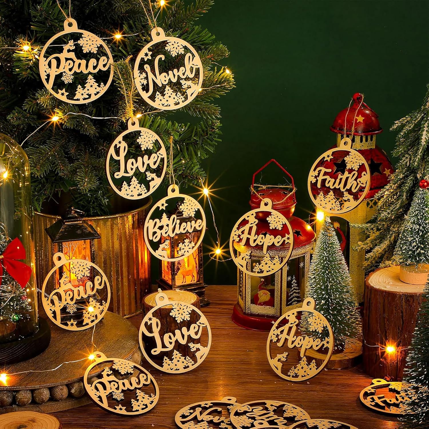 Decorative Christmas ornaments with motivational phrases on a festive table setting.