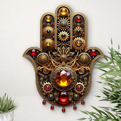 Decorative wall art in the shape of a hand with intricate designs and colorful gemstones on a white background.