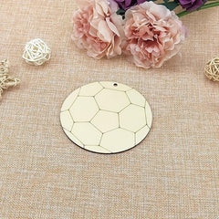 Decorative round mirror with geometric pattern on a textured beige surface with flowers and decorative elements.