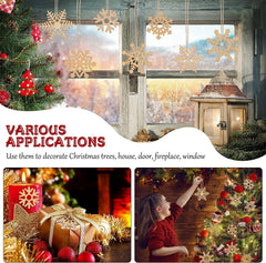 Decorative snowflake ornaments on a window with Christmas tree and fireplace in the background.