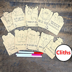 Set of animal-themed cards with markers on a wooden surface, branded 'Cliths'.