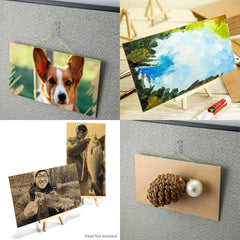 Collage of various photo prints on a textured surface with a small pine cone and pearl on a cardboard piece.