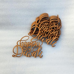 Wooden decorative piece with 'Happy Diwali' text on a light background