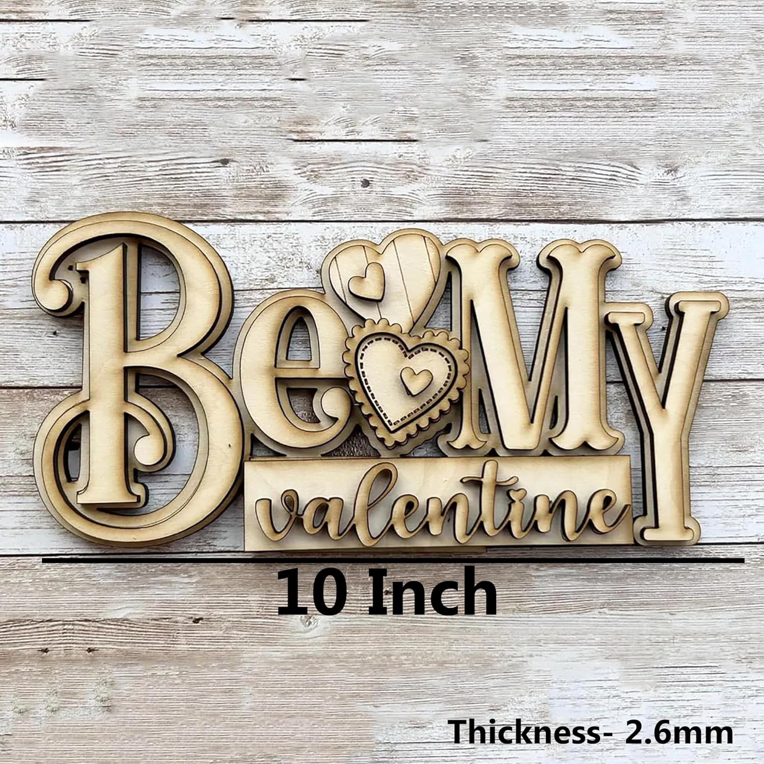 Wooden decorative sign with 'Be My Valentine' text on a wooden background