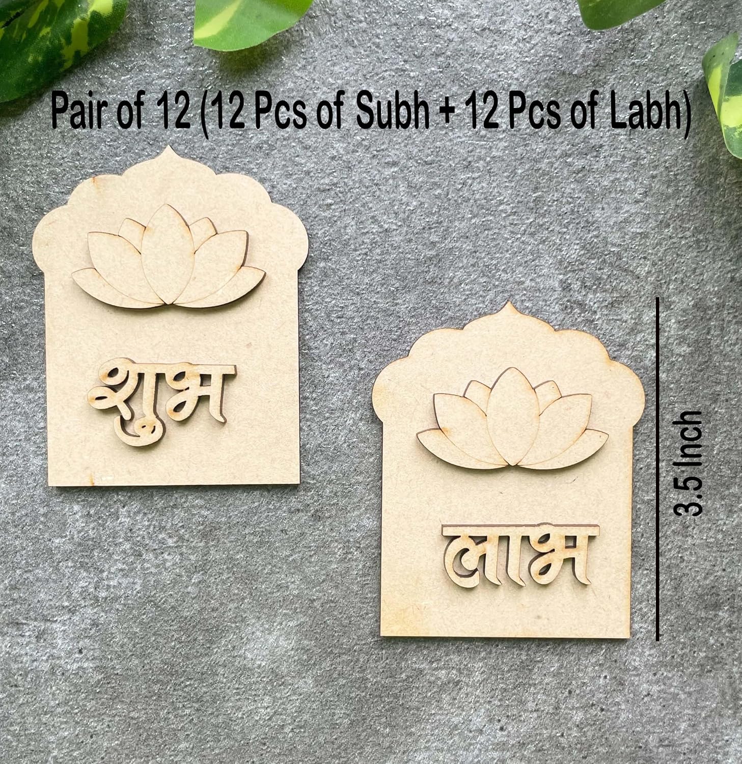 Two wooden lotus-shaped signs with 'Subh' and 'Labh' text on a gray background.