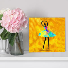 Colorful ballet dancer painting on a yellow background with pink flowers and a vase.
