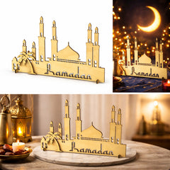 Decorative Ramadan sign with mosque silhouette and 'Ramadan' text, displayed indoors and outdoors.