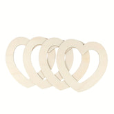 Set of five beige heart-shaped objects on a white background