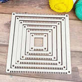 Metal knitting needle case with square patterns on a wooden surface