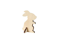 Wooden rabbit cutout on a white background