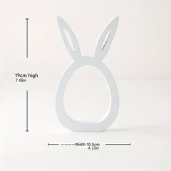 White bunny-shaped headband with measurements on a light gray background