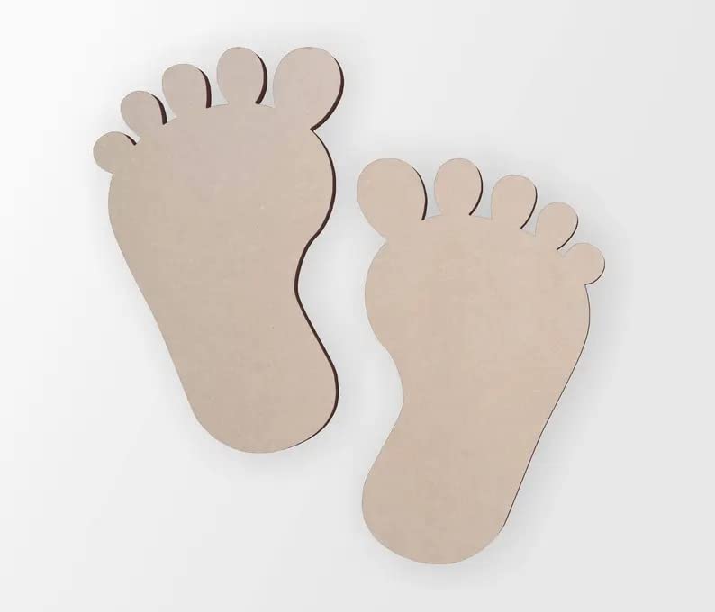 Two cardboard footprints on a white background