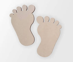 Two cardboard footprints on a white background