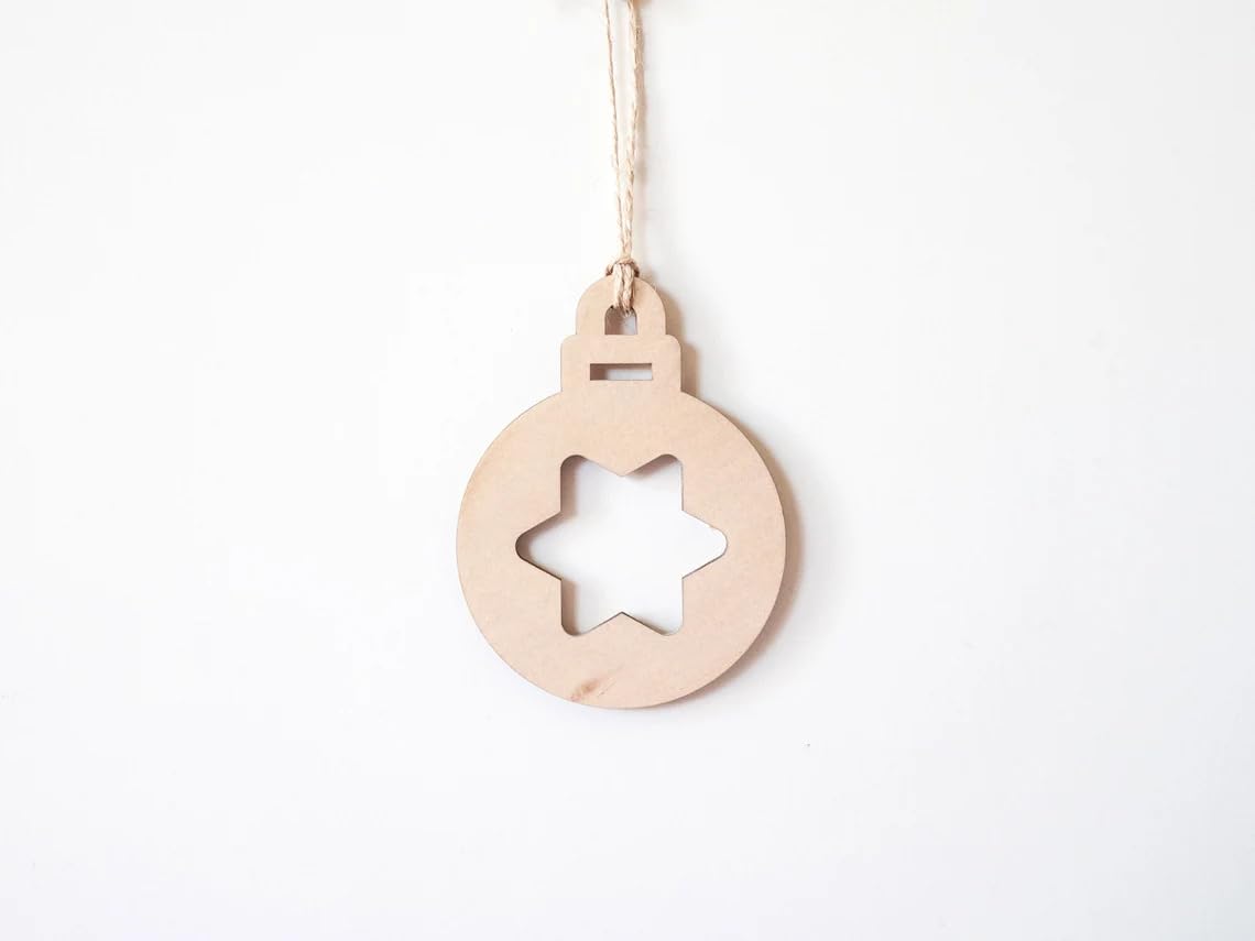 Wooden Christmas ornament with star cutout on a white background
