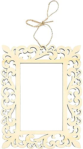 Decorative photo frame with intricate cut-out design on a white background