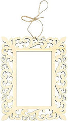 Decorative photo frame with intricate cut-out design on a white background