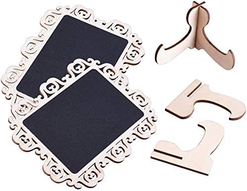 Decorative wooden frames with black boards and hanger attachments on a white background