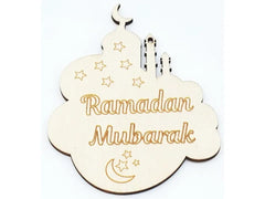 Decorative cloud-shaped sign with 'Ramadan Mubarak' text on a white background