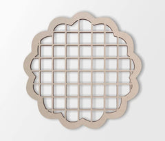 Decorative wall art with grid pattern on a light gray background