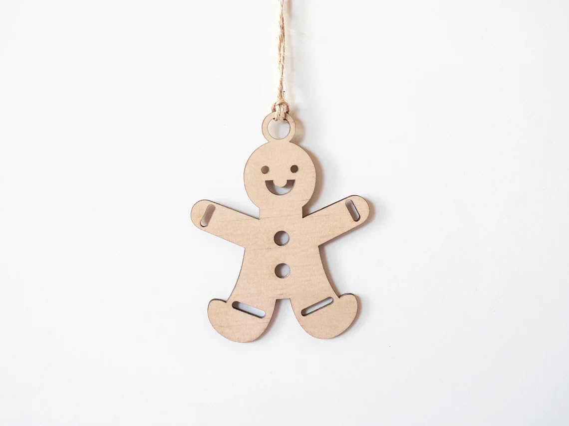 Wooden gingerbread man ornament on a white background