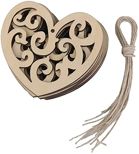 Heart-shaped wooden box with intricate cut-out design and a string on a white background