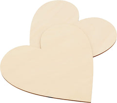 Three heart-shaped wooden cutouts on a white background