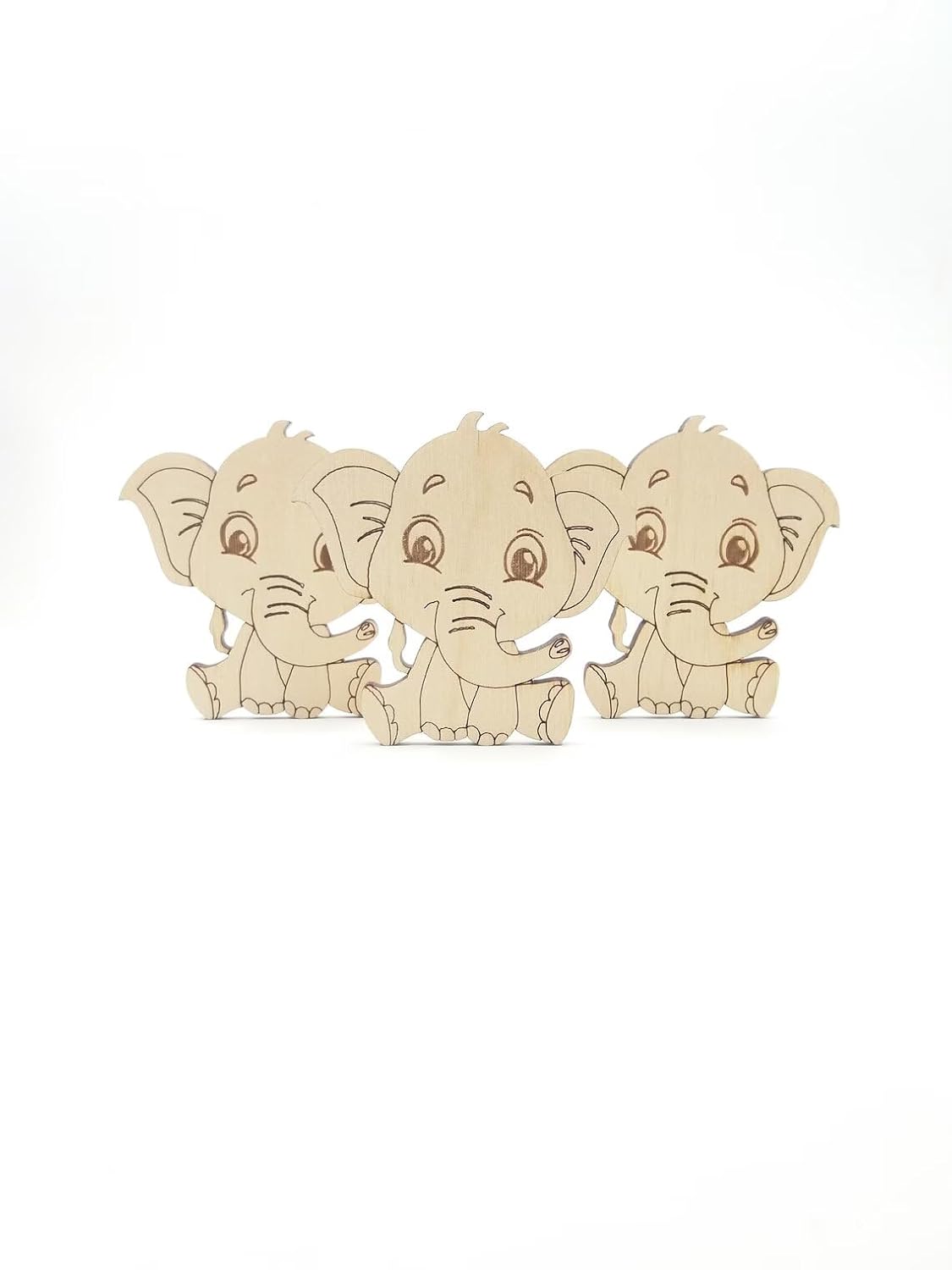 Three wooden elephant figures on a white background