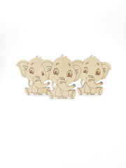 Three wooden elephant figures on a white background