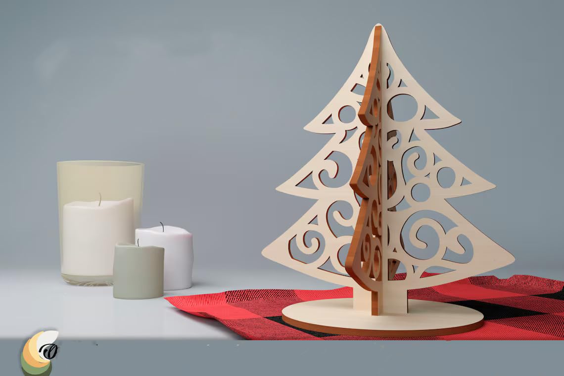 Wooden Christmas tree decoration on a table with candles and a red cloth