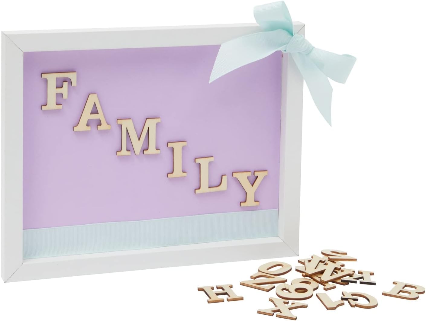 Decorative sign with 'FAMILY' letters on a purple background, accompanied by wooden letters.