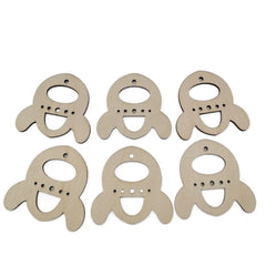 Six wooden turtle-shaped tags on a white background
