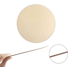 Round beige object held by a hand with a close-up inset showing a stick.