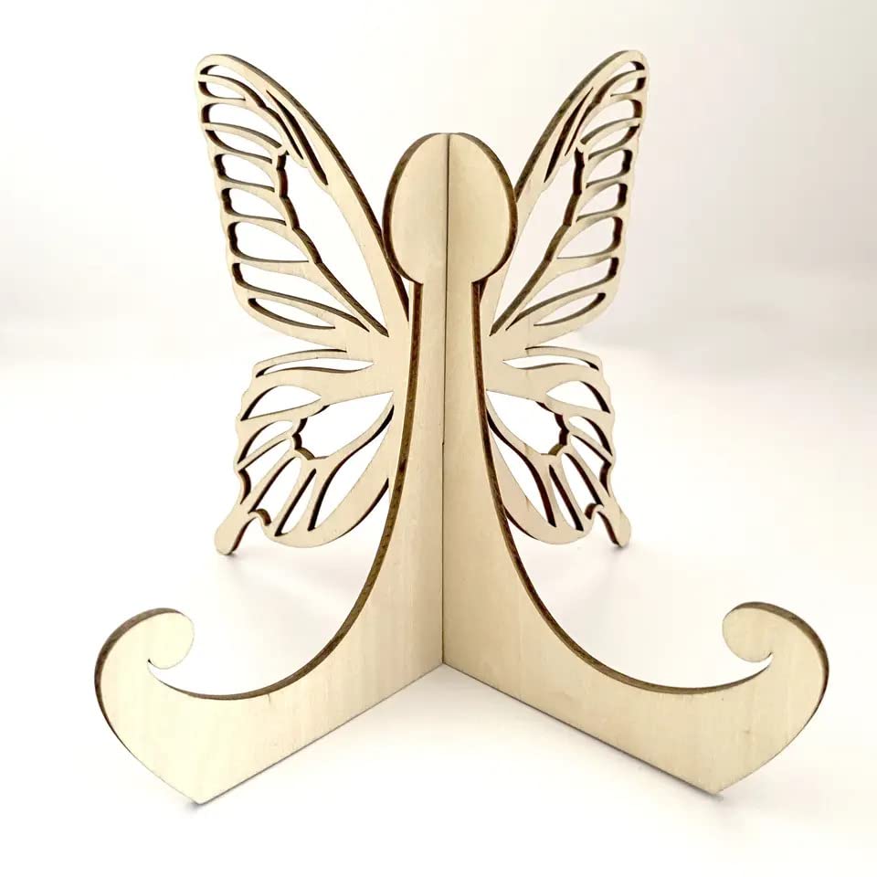 Gold butterfly bookend on a white background