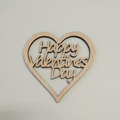 Wooden heart-shaped sign with 'Happy Valentine's Day' text on a light gray background