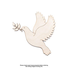Wooden dove with outstretched wings holding an olive branch on a white background