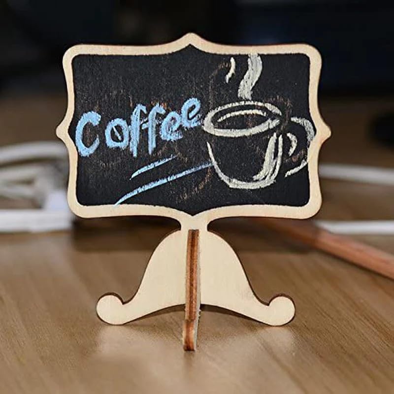 Small chalkboard sign with 'Coffee' and a coffee cup drawing on a wooden stand.