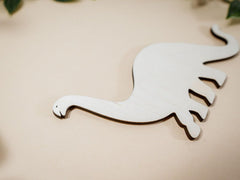 White foot-shaped object on a beige background