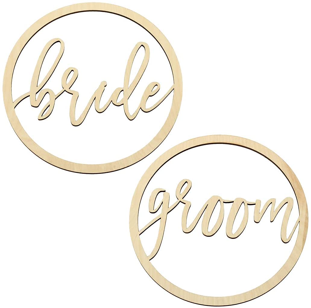 Two gold circular signs with 'bride' and 'groom' text on a white background