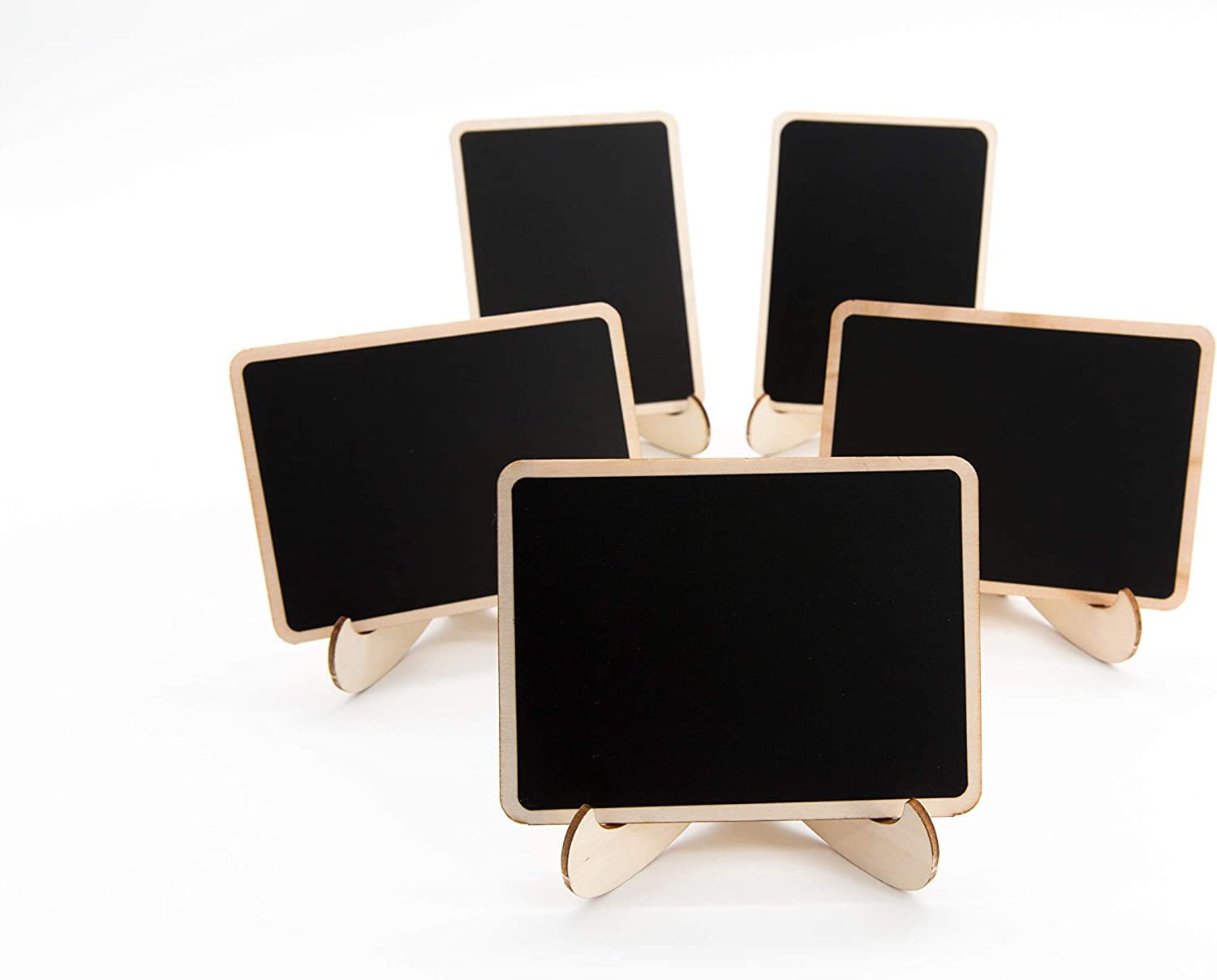 Set of five small blackboards with gold stands on a white background