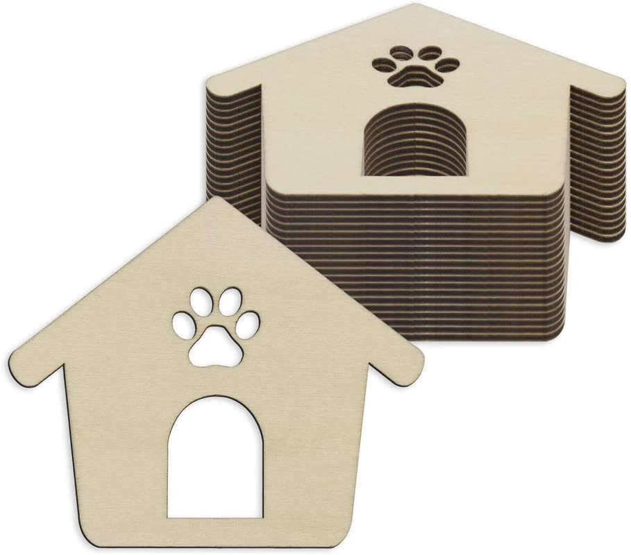 Stack of cardboard dog house-shaped cutouts with paw prints on a white background