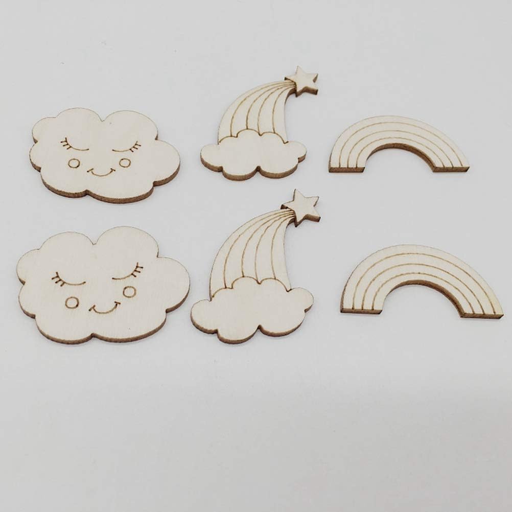 Wooden cutouts of clouds and rainbows on a light gray background