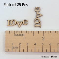 Pack of 25 wooden 'LOVE' word charms with a ruler for scale on a white background.