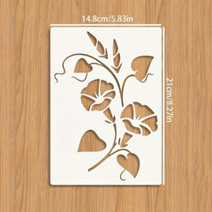 Floral design stencil with measurements on a wooden surface