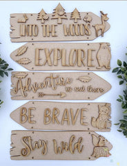 Set of wooden signs with motivational phrases on a white background
