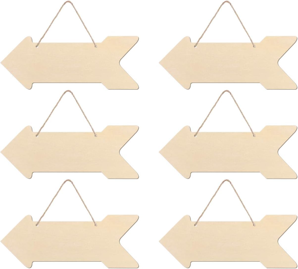 Set of six wooden arrow-shaped signs with hanging strings on a white background