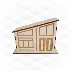Wooden model of a house with geometric design on a white background